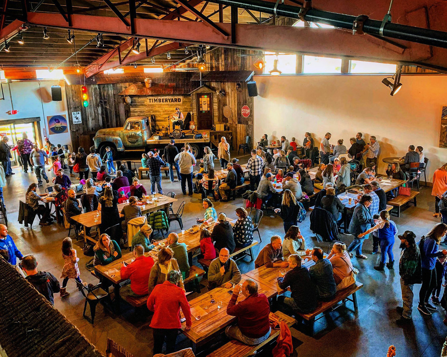 packed taproom with lots of customers