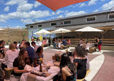 Customers sitting outside in beer patio